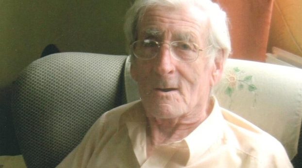 Jack Beedham at home with a Sheffield Star book 100 Years of Stainless Steel, edited by Nancy Fielder (2013). Photo by Ann Beedham.