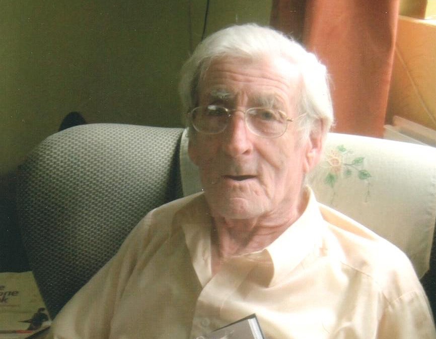 Jack Beedham at home with a Sheffield Star book 100 Years of Stainless Steel, edited by Nancy Fielder (2013). Photo by Ann Beedham.