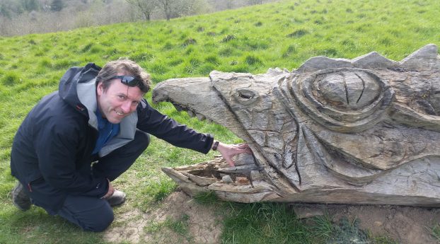 David Clarke with a sculpture of the Wantley Dragon.