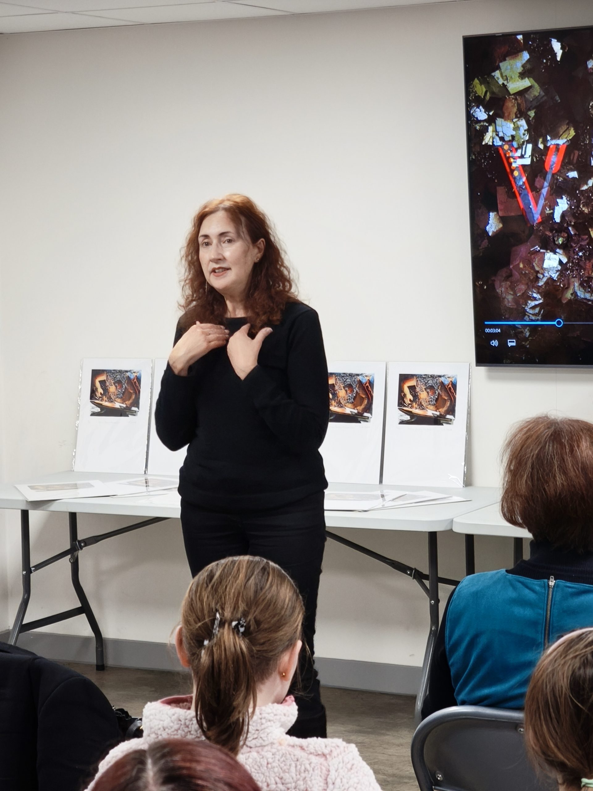 Poet and co-narrator Carolyn Waudby at the Land of Iron Cradle of Fire event photo by Nick Wesson